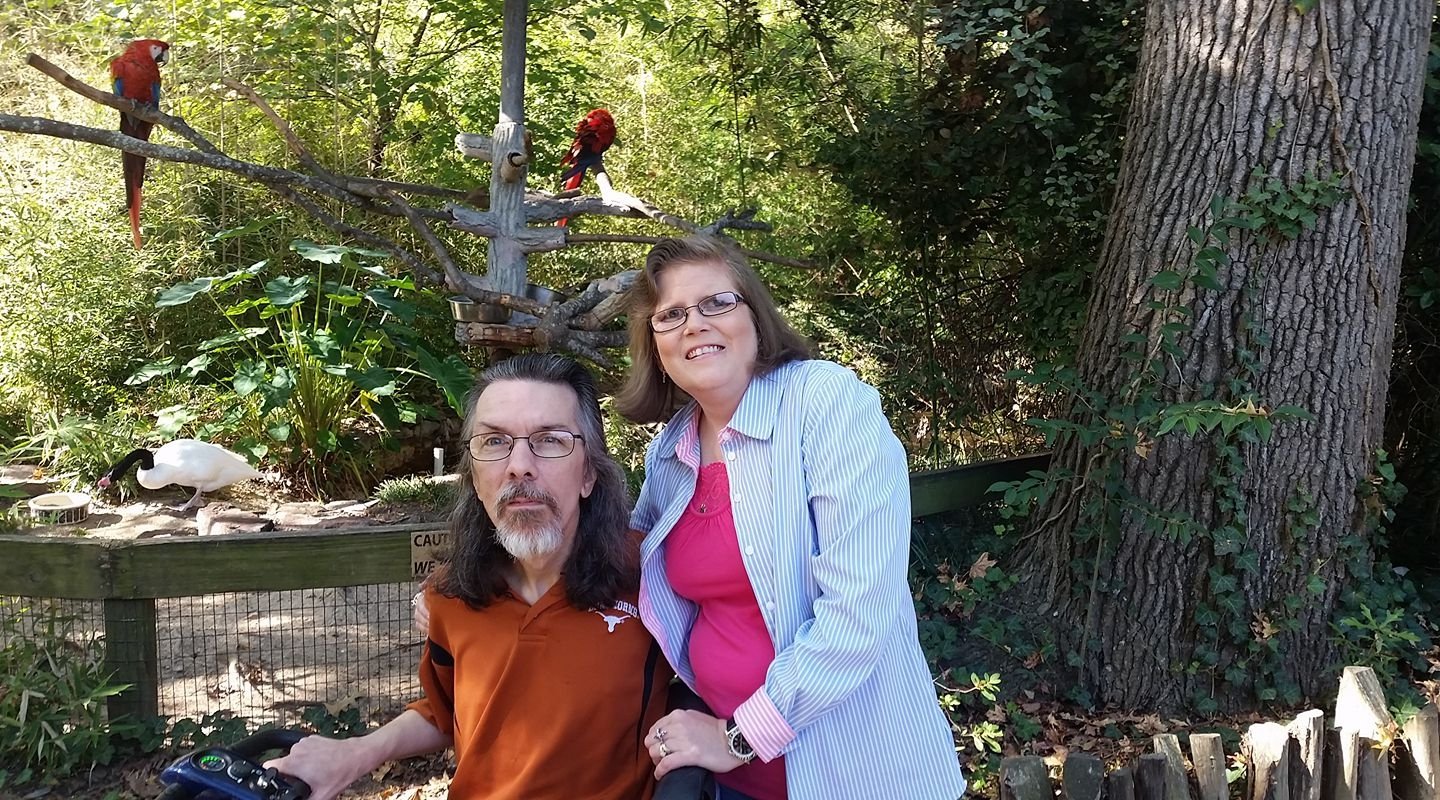 Shane and Michelle with parrots