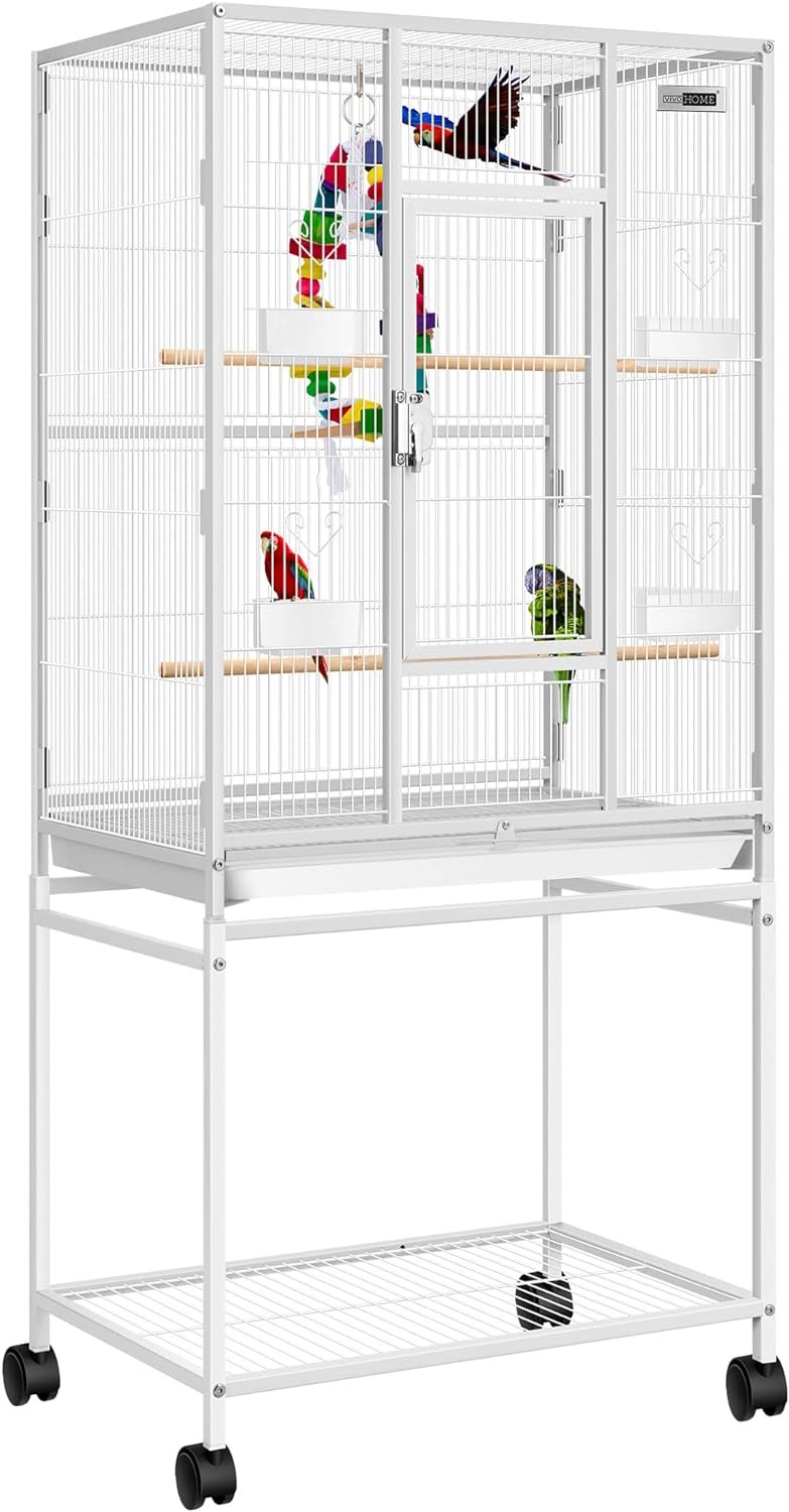 a white bird cage with colorful birds in it